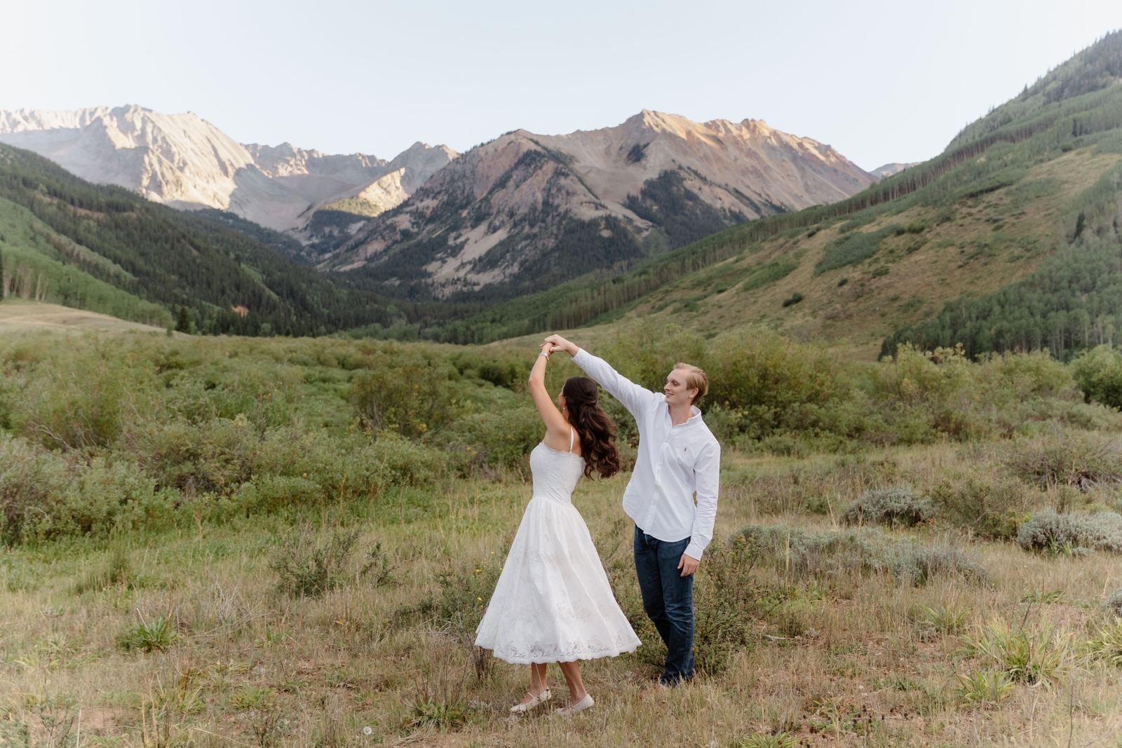 Valeria & Zachary dancing in the mountains
